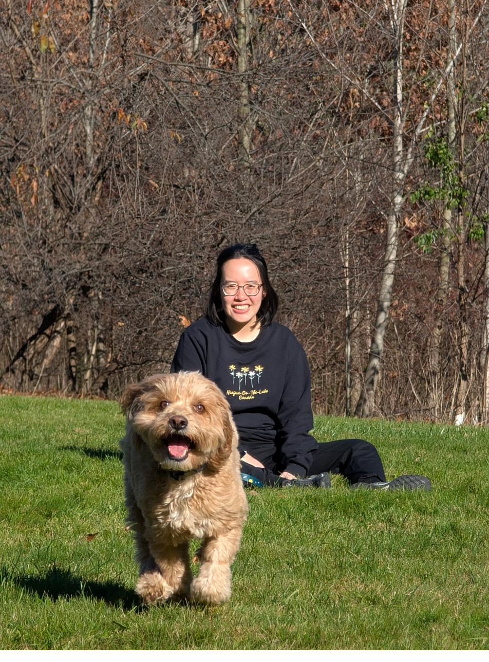 Twix running through a park toward the camera